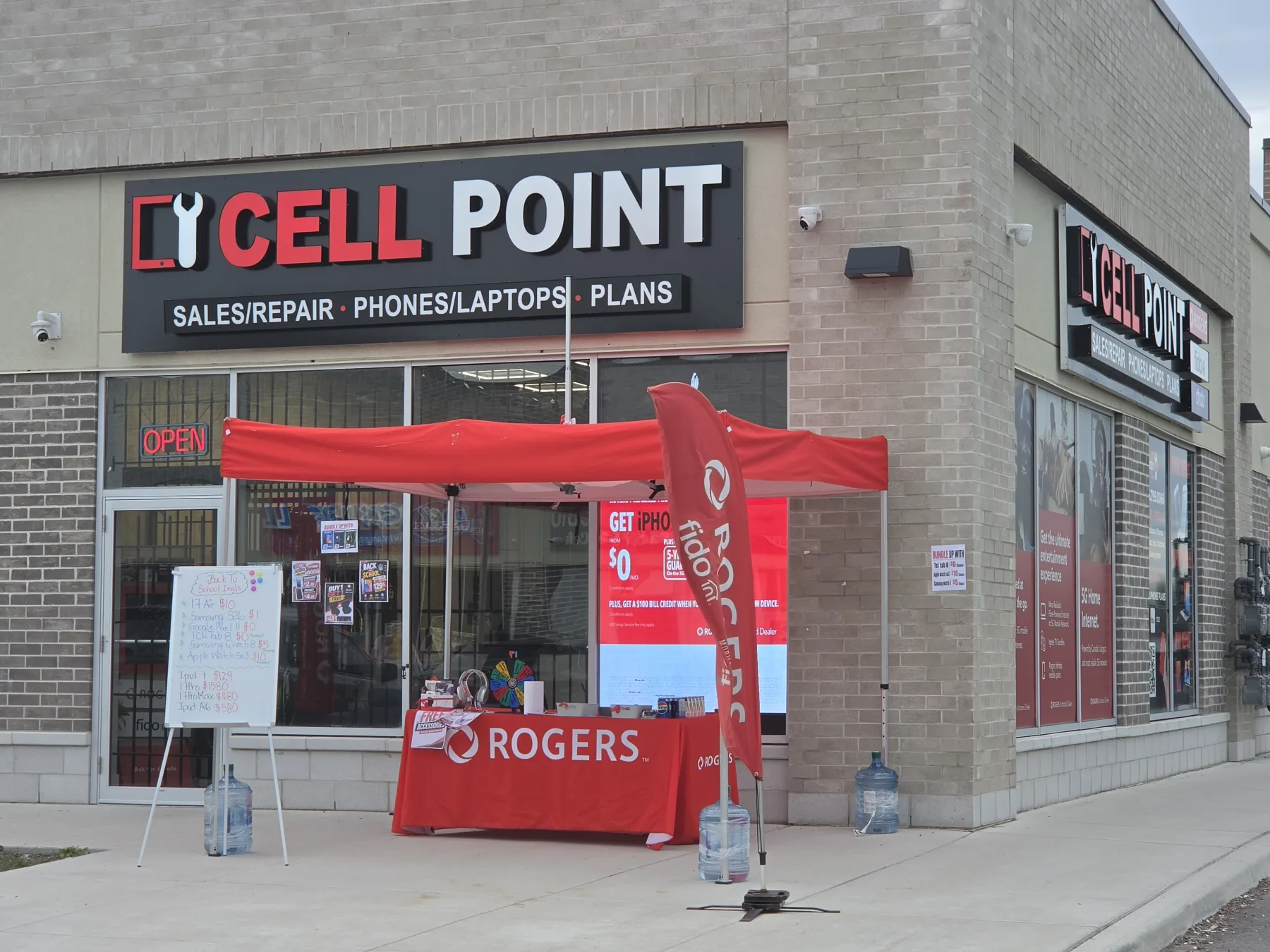 CellPoint storefront at 6171 Mayfield Road in Brampton with Rogers wireless display