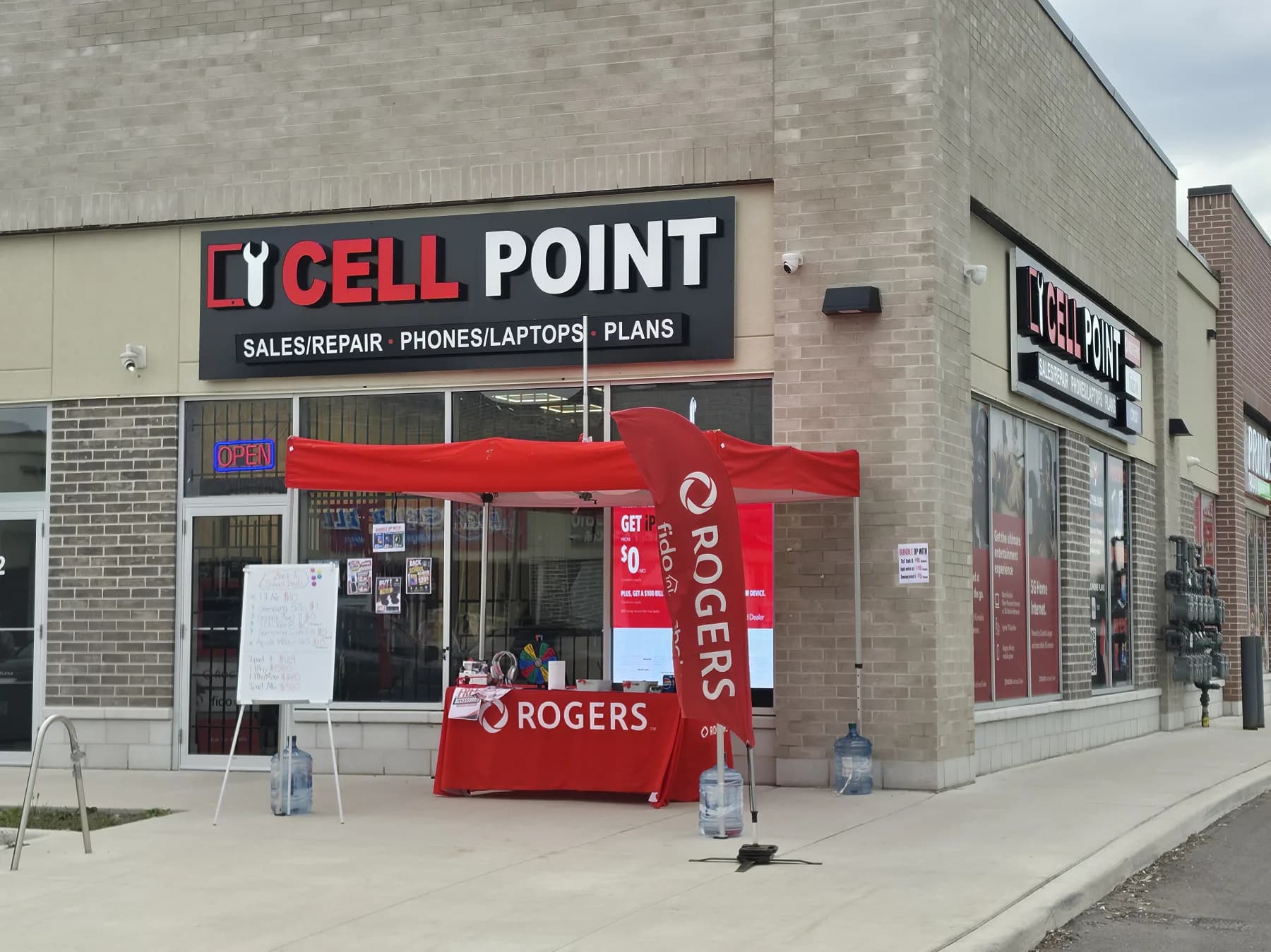 CellPoint Brampton storefront featuring an outdoor Rogers wireless display